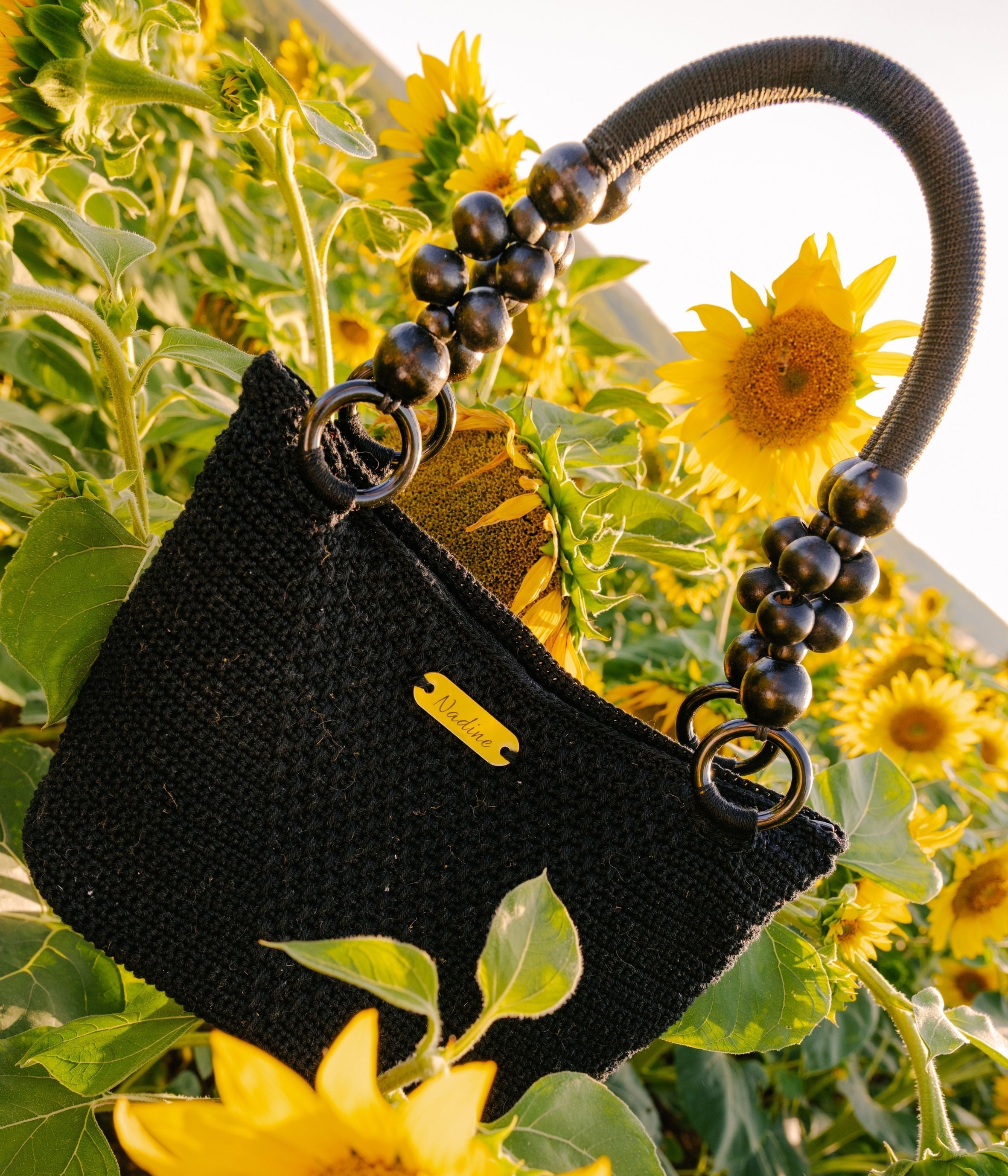 Sac à main crochet noir et perles en bois