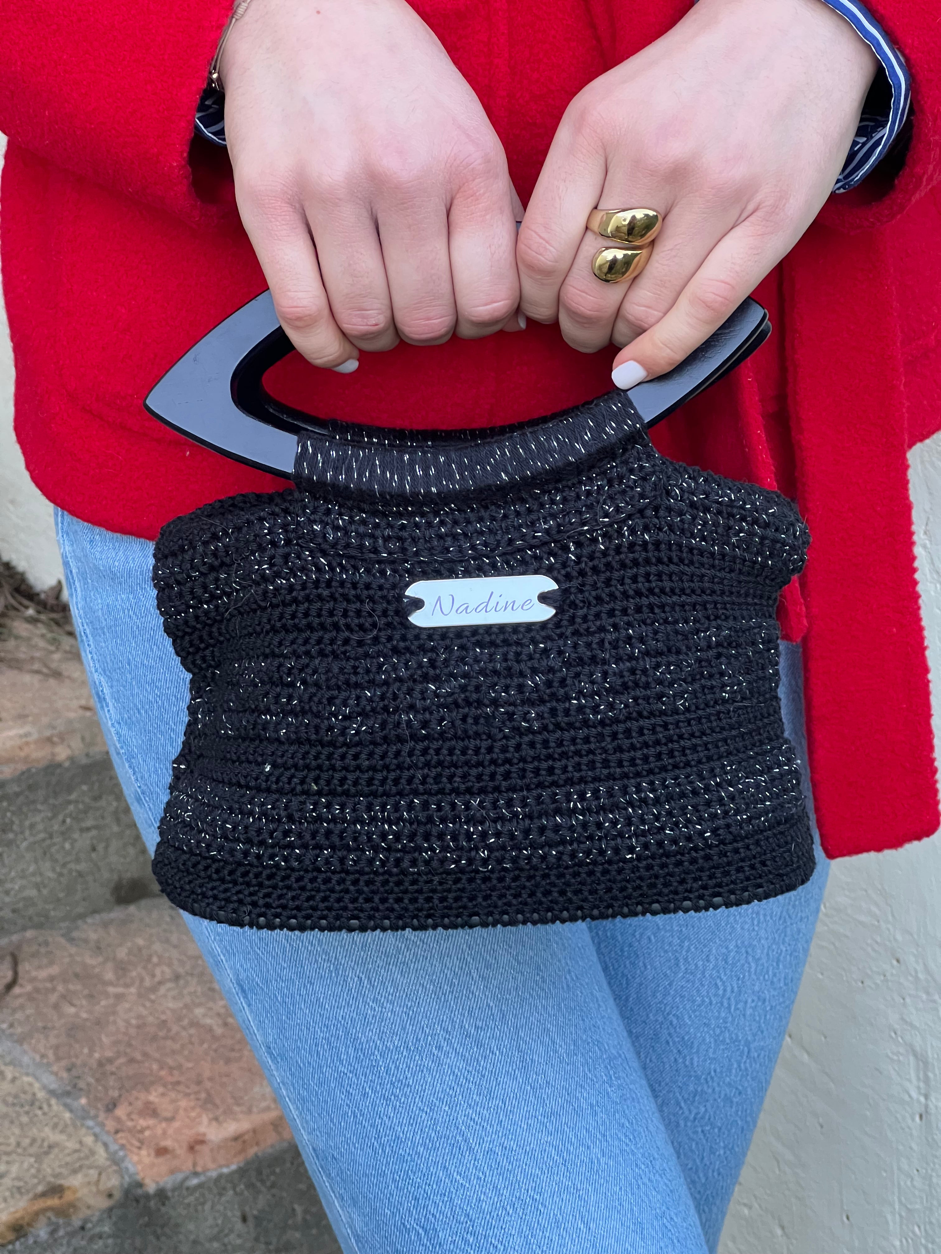 Sac en crochet noir scintillant à anses noires